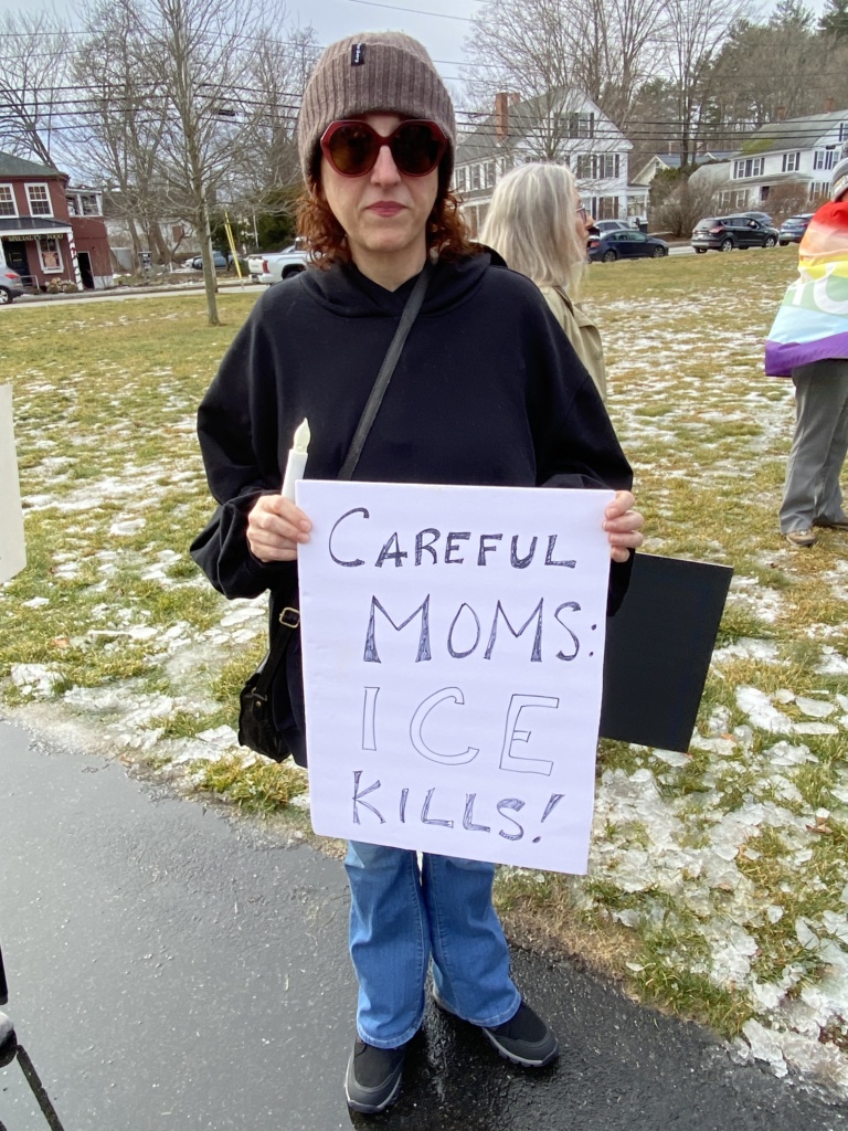 Miranda with protest sign